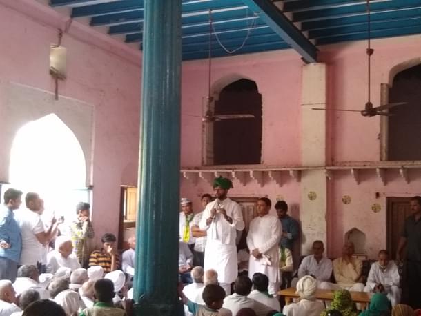 Digvijay addressing people in Thana Kalan village