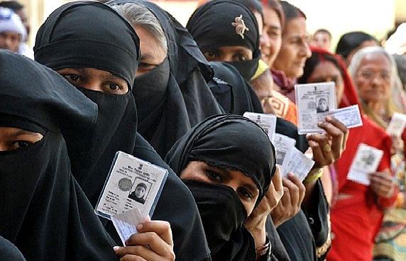 Muslim women outside a polling station.
