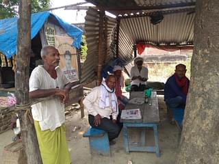 Men from the Yadav community at a tea point in Camperganj. (Prakhar Gupta/Swarajya Magazine)