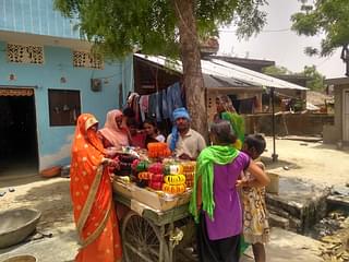 Women buying bangles in the Dalit colony. (Prakhar Gupta/Swarajya)