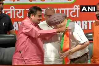 Union Minister Nitin Gadkari welcomes S S Channy into the party. (@ANI/Twitter)