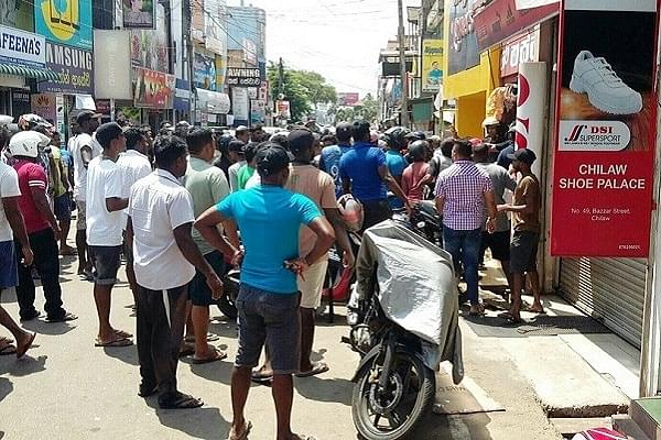 People out in the streets of Chilaw (Pic via Twitter)