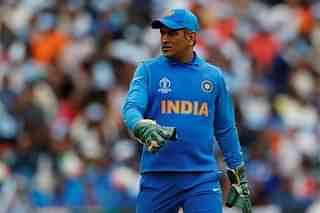 Mahendra Singh Dhoni with changed gloves (Pic via twitter)