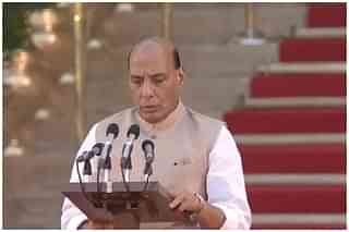 India’s Defence Minister Rajnath Singh taking oath of office and secrecy at the Rashtrapati Bhawan on 30 May 2019. (BJP4India/Twitter)
