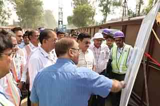 Officials and engineers at site of piling work for Delhi-Meerut RRTS Corridor near Duhai.&nbsp;