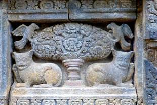 A tree carved out on a temple wall. Wikimedia Commons.