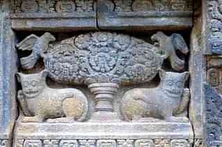 A tree carved out on a temple wall. Wikimedia Commons.