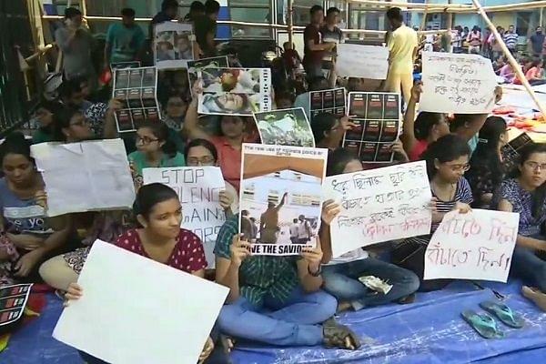Doctors of NRS College and Hospital sit in protest.