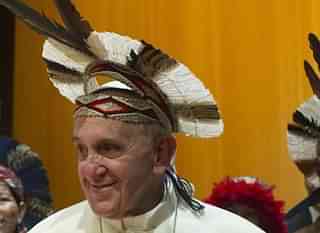 Pope wearing a tribal headdress in Brazil (pic via Facebook)