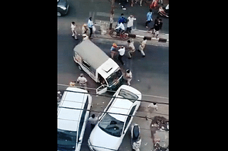Video screengrab of fight between tempo driver and police