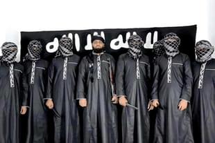 Pro-IS Telegram channels released pictures of three of the alleged suicide bombers in Easter attacks with the IS flag as the backdrop (via Facebook)