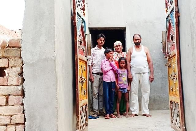 Dilsher Khan with his family in his Mehfooz Nagar house. Photo by special arrangement