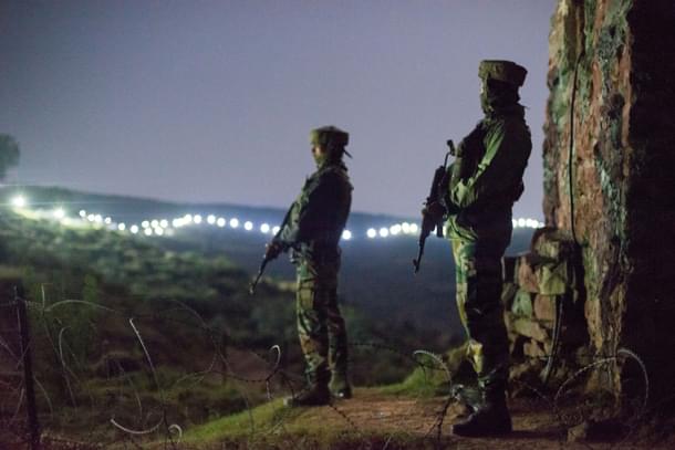 Indian Army soldiers at forward posts beyond the illuminated fence. (Representative Image) (Gurinder Osan/Hindustan Times via Getty Images) 