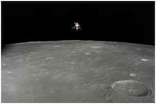The Apollo 12 Lunar Module, in a lunar landing configuration, is photographed in lunar orbit. (NASA/Johnson Space Center)