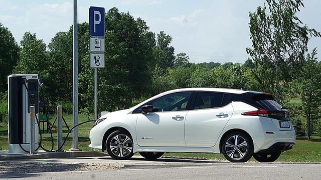 A second generation Nissan Leaf at a quick-charging station in Europe. (Marruciic/Wikipedia)