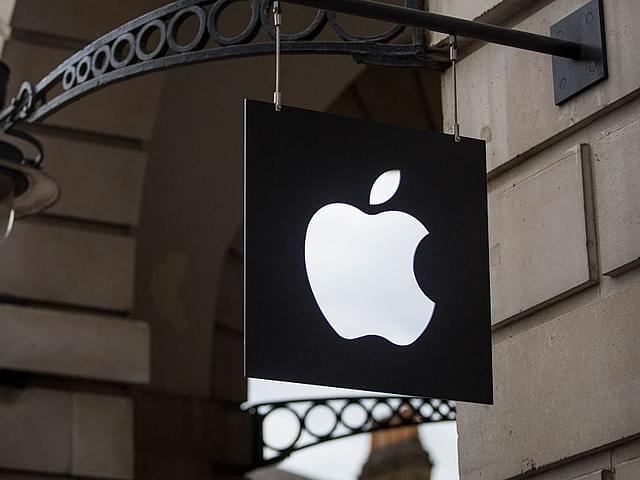 The Apple logo sits on a sign outside company’s Covent Garden store  in London, England. Photo credit: Jack Taylor/Getty Images