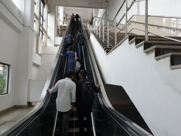 Commuters take the elevator at the Alandur metro station to reach the platforms to go to Chennai MGR Central and Washermanpet. 