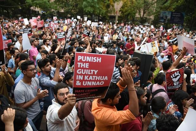 People protest against the Kathua and Unnao rape cases in New Delhi. (Arvind Yadav/Hindustan Times via Getty Images)