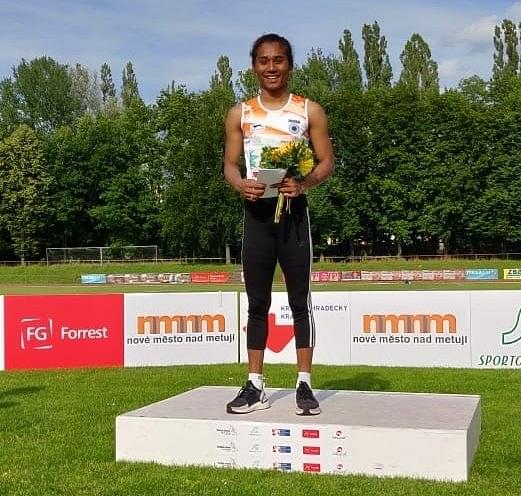 Hima Das with her fifth gold medal of the month. (Image Source:- Twitter/HimaDas8)
