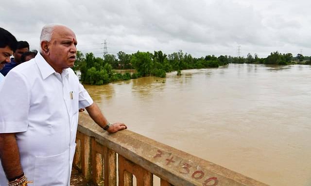 Chief Minister B S Yediyurappa at a flood impact assessment spot