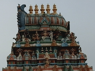 The imposing <i>gopuram </i>of another temple on the banks of the Cooum River.