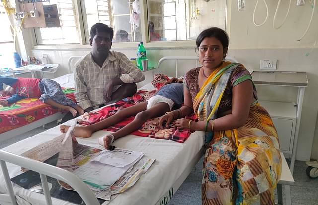 Gauri and Ramnivas with their seven-year-old son at BRD.