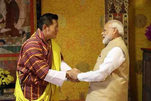 Bhutan’s King Jigme Khesar Namgyel Wangchuck welcomes Prime Minister Narendra Modi. (Narendra Modi/Twitter)