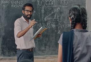 A still from the film, that portrays the central theme - A malayali teacher is appointed to a Kannada medium school and admonishes students who insist on using Kannada
