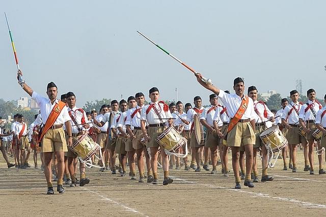 RSS cadets perform a drill during Vijaya Dashmi. (Photo credit: STR/AFP/GettyImages)