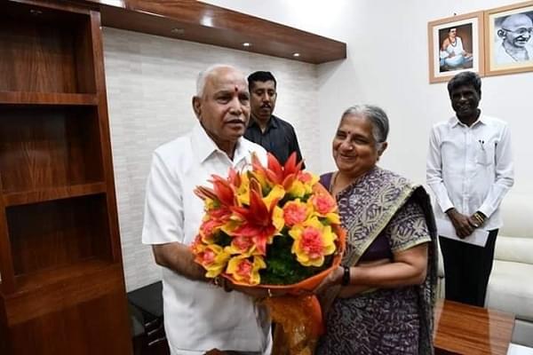 Karnataka Chief Minister B S Yediyurappa welcoming Sudha Murty to the meeting on tourism. 