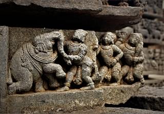 Kuvalayapeeda the royal elephant of Kamsa being slayed by Sri Krishna.