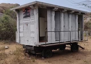 A mobile toilet unit of the Hampi World Heritage Area Management Authority, Hospete that lies abandoned and unfit for use in Hampi