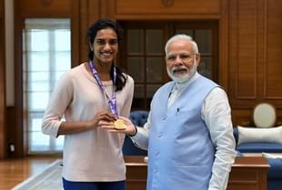 P V Sindhu with PM Modi. (image via @narendramodi/Twitter)