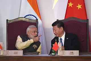 Prime Minister Narendra Modi (L) and Chinese President Xi Jinping (PRAKASH SINGH/AFP/Getty Images)
