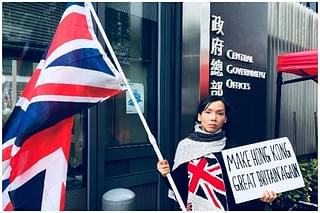 Woman protesting against China’s misadventure in Hong Kong. (Twitter)