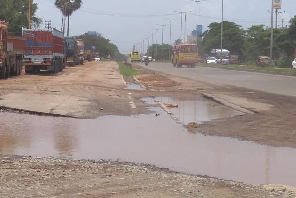 A National Highway in the district ravaged by rain. Note the absence of service roads here as well.&nbsp;