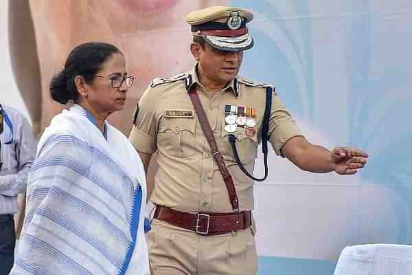 Bengal Chief Minister Mamata Banerjee with senior IPS officer Rajeev Kumar.