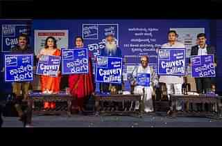 Dignitaries holding ‘Cauvery Calling’ signs prior to the rally.