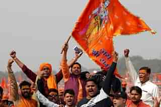 Members of a Hindu group shout slogans.
