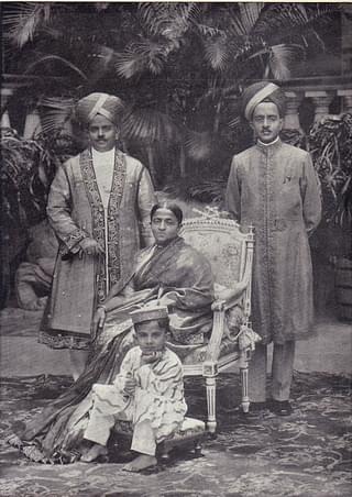 Krishnaraja Wadiyar (L), Kantaveera Narasimharaja Wadiyar (R) with their mother, Kempa Nanjammani Vani Vilasa, and Jaya Chamaraja Wadiyar (seated).