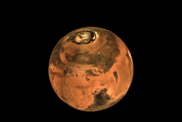 A picture of the red planet in which its northern polar region is visible.&nbsp; (ISRO)