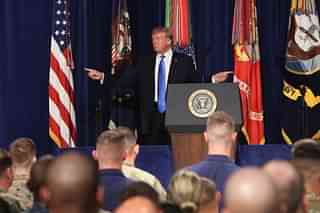 US President Donald Trump gestures before delivering remarks on America’s military involvement in Afghanistan at the Fort Myer military base on 21 August  2017 in Arlington, Virginia. (Mark Wilson/GettyImages)