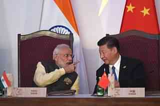 Prime Minister Narendra Modi with China’s President Xi Jinping (PRAKASH SINGH/AFP/Getty Images)