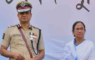 Bengal Chief Minister Mamata Banerjee with senior IPS officer Rajeev Kumar.