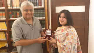 Sushma Swaraj's daughter Bansuri Swaraj visited senior lawyer Harish Salve on Friday and presented a coin of Re 1. (Photo credit: India Today)