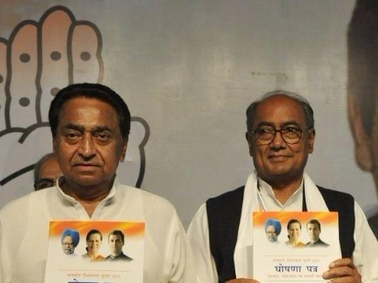 MP CM Kamal Nath (L) with state leader Digvijaya Singh (Mujeeb faruqui/Hindustan Times via Getty Images)