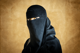 A burqa-clad Muslim woman. 