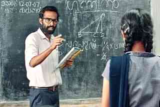 A still from the film, that portrays the central theme - A malayali teacher is appointed to a Kannada medium school and admonishes students who insist on using Kannada