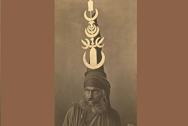 A Nihang in the 1860s with a characteristically elaborate turban (Source: Wikimedia Commons)