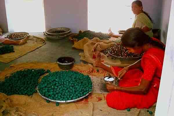 Workers at Shivkasi making environment-friendly firecrackers.